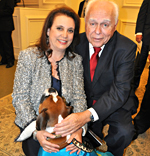 Center for Children Co-Chair Doreen Schonbrun with her husband Myron Schonbrun and their favorite Service Dog Kima